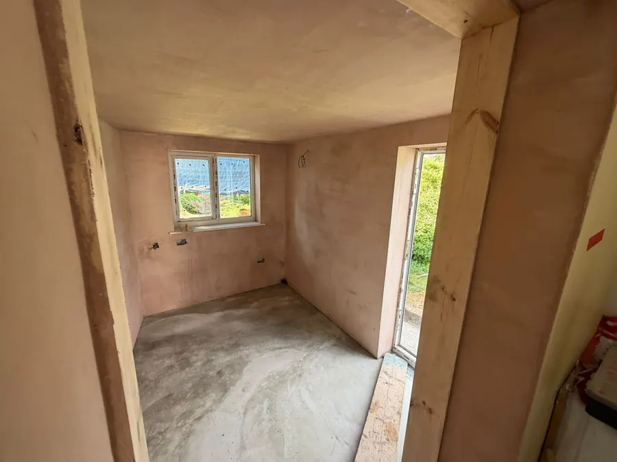 A room replastered around a new opening