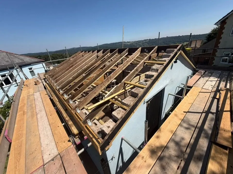 New roof timber frame and rafters under construction