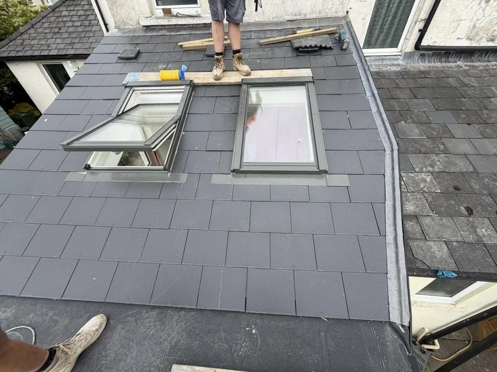 Finished natural slate roof covering